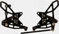VORTEX rear set complete black foot controls for Kawasaki motorcycle, featuring foot pegs and shift/brake levers.
