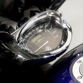 Close-up of the National Cycle Speedometer Cowl 562-30305 accessory, showing its durable plastic design for motorcycle speedometer protection.