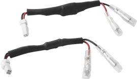 Pair of RIZOMA turn signal cable kits for electrical wiring, including connectors and cables for motorcycle or vehicle signals.