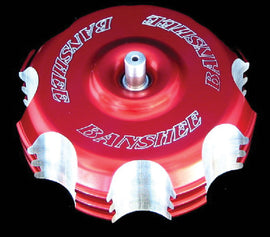Red logo ModQuad billet gas cap for ATV or motorcycle, featuring a sleek metal design and durable construction.