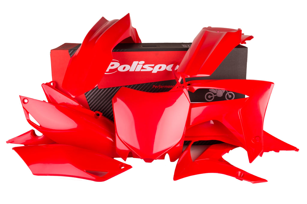 Polisport Plastics red plastic body kit for off-road motorcycles, including front and side panels, on a white background.