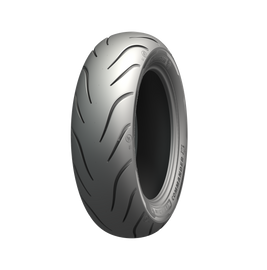 Michelin Tire Commander III Touring Rr 180/65B16 bias tire with tread pattern, sidewall markings, and branding visible.