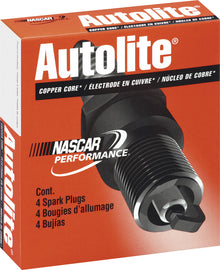 Autolite copper spark plug 4123/4, model 4-4123, showing the metal shell and ceramic insulator for automotive ignition systems.
