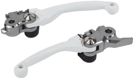Polisport Plastics pivot lever set for Kawasaki motorcycle, showcasing durable levers with mounting hardware and branding details.