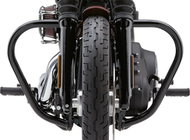 Black Cobra Freeway Bars Vbend 1.25-inch body protection for Harley FXD/B/C models 1991-2017, shown in image.