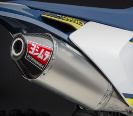 Yoshimura RS-4 exhaust slip-on with stainless steel, aluminum, and carbon fiber end cap, featuring header and canister components.