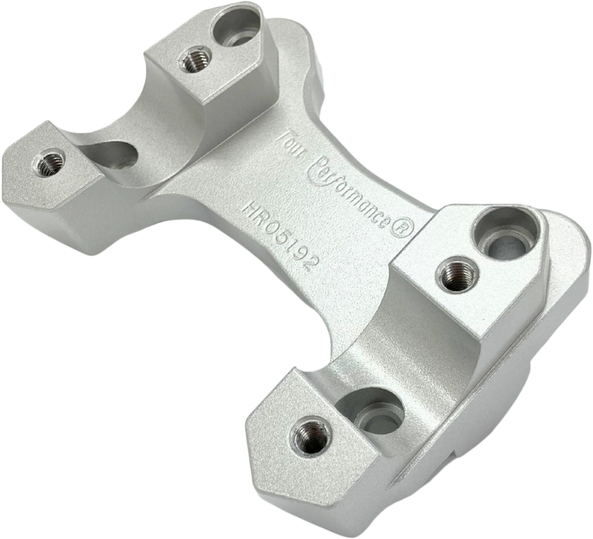 HeliBars Tour silver handlebar risers for BMW motorcycle, showing the sturdy metal construction and installation details.