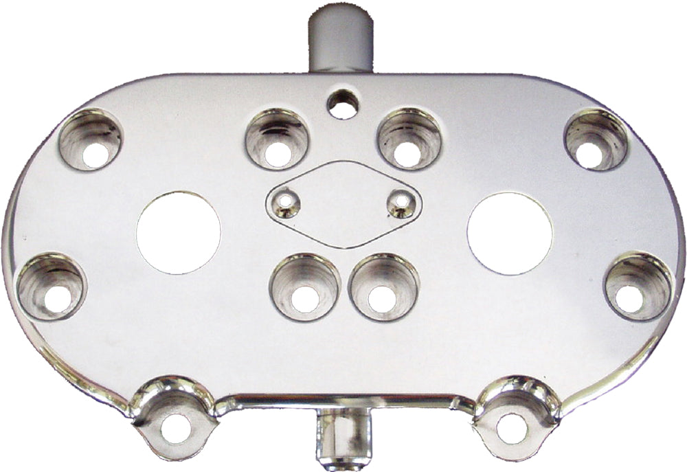 Polished ModQuad Head Shell 28-41870 showing smooth, shiny surface with mounting holes and detailed design for machinery use.