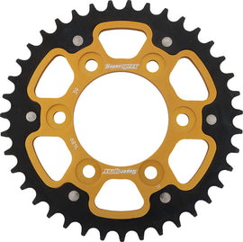 Supersprox Kawasaki ZX rear stealth aluminum and steel 39-tooth sprocket, gold color, showcasing teeth and mounting hole details.