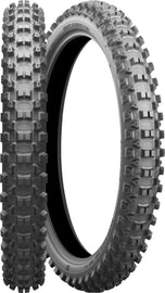 Bridgestone Battlecross E50 Extreme Front motorcycle tire 140/80-18 bias ply, tread pattern and sidewall visible.