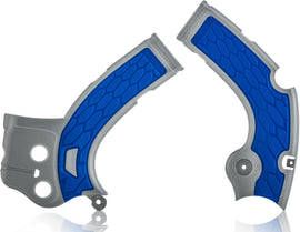 Acerbis X-Grip off-road frame guard in silver and blue mounted on motorcycle frame for protection and style.