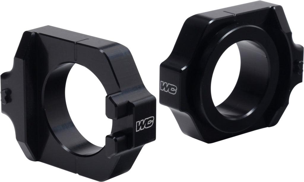 WORKS Axle Blocks Elite Hon Black drive axle blocks, durable black metal with precise fit for vehicle stability.