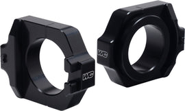 WORKS Axle Blocks Elite Hon Black drive axle blocks, durable black metal with precise fit for vehicle stability.