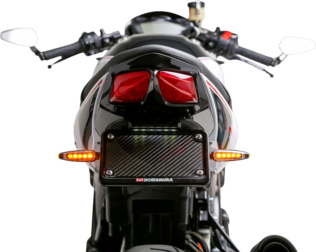 Yoshimura Fender Eliminator V2 Kit for Suzuki motorcycles, close-up of black body component with mounting hardware.