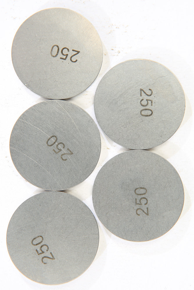 K&L engine valve shims, 2.50mm x 29mm, set of 5, used for adjusting engine valve clearance, in a clear image.