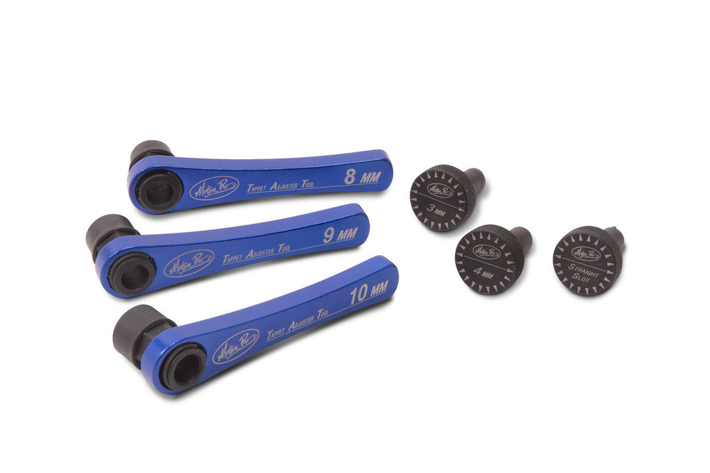 Motion Pro Tappet Adjuster Tool Set 57-8721 with multiple precision tools for motorcycle valve adjustments on a workbench.
