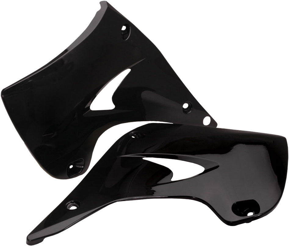 Black Acerbis radiator shrouds for street motorcycles, featuring sleek design and durable construction.