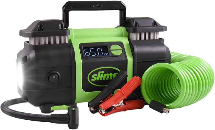 Slime Super Duty Pro Power Tire Inflator with digital gauge and hose, black and red tools for vehicle tire inflation.
