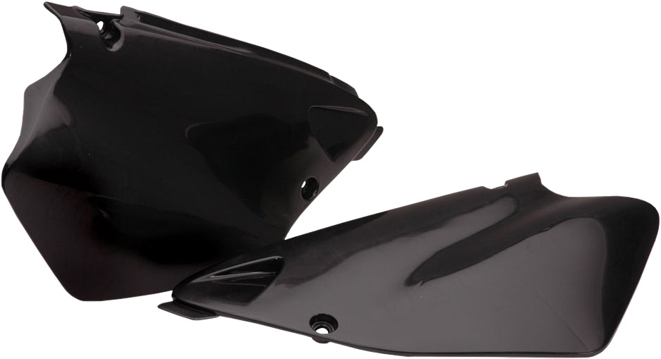 Black Acerbis side panels for motorcycle, featuring the Acerbis logo and sleek design, installed on a bike.