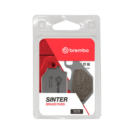BREMBO Upgrade Sx brake pads sintered for enhanced braking performance, shown in a close-up image of the brake pads.