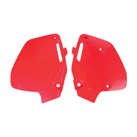 Red Polisport Plastics side panels for CR125/250 dirt bikes, designed as durable body parts with mounting features.
