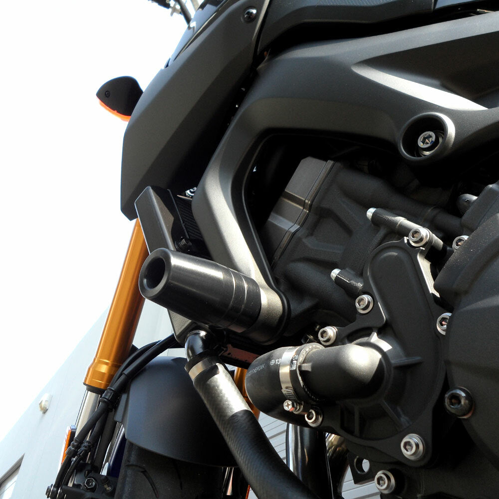 Black Shogun Industries Frame Sliders for motorcycle body protection, no cut design, mounted on a bike frame.