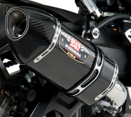 Yoshimura Street R-77 slip-on exhaust with stainless steel and carbon fiber components, designed for motorcycle performance.
