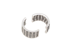 SP1 engine bottom rod bearing part number 54-8800, close-up view showing metal bearing with markings and smooth surface.