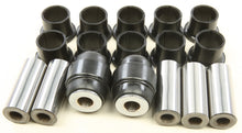 Load image into Gallery viewer, All Balls rear independent suspension kit with components assembled on a workbench, showcasing the suspension parts for motorcycles.