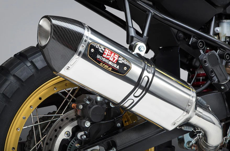 Yoshimura Street Ex R77 slip-on motorcycle exhaust on Suzuki V-Strom 1000, featuring polished metal finish and sleek design.