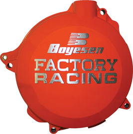 Boyesen Factory Racing Clutch Cover in orange for motorcycle, showcasing durable design and branding on the clutch cover.