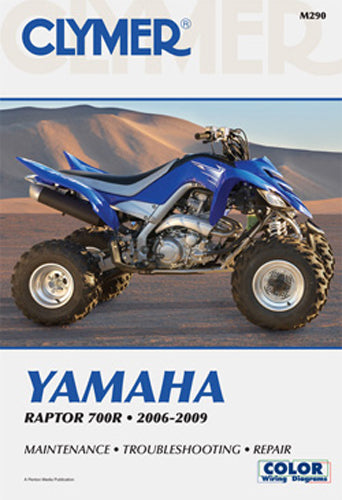 Clymer repair manual for Yamaha Raptor 700, showing detailed engine and parts diagrams in the open manual.