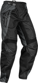 Fly Racing F-16 pants in black and charcoal, size 46, featuring durable riding gear and protective design.