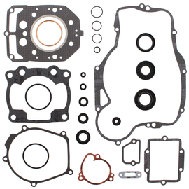 Vertex complete gasket set with oil seals, featuring multiple gaskets and seals for engine repair, displayed on a white background.