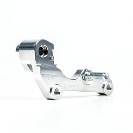 Braking Batfly Rotor Bracket 32-1088 mounted on a bicycle frame, showcasing the sturdy mounting bracket for brake rotor installation.