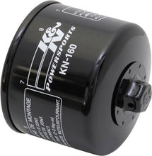 Load image into Gallery viewer, K&amp;N oil filter 56-0160 showing the cylindrical metal filter with rubber sealing edges for automotive engine oil filtration