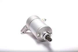 Ricks Motorsport Electric starter motor for LTZ250 motorcycle, showing the compact electric starter with wiring connections.