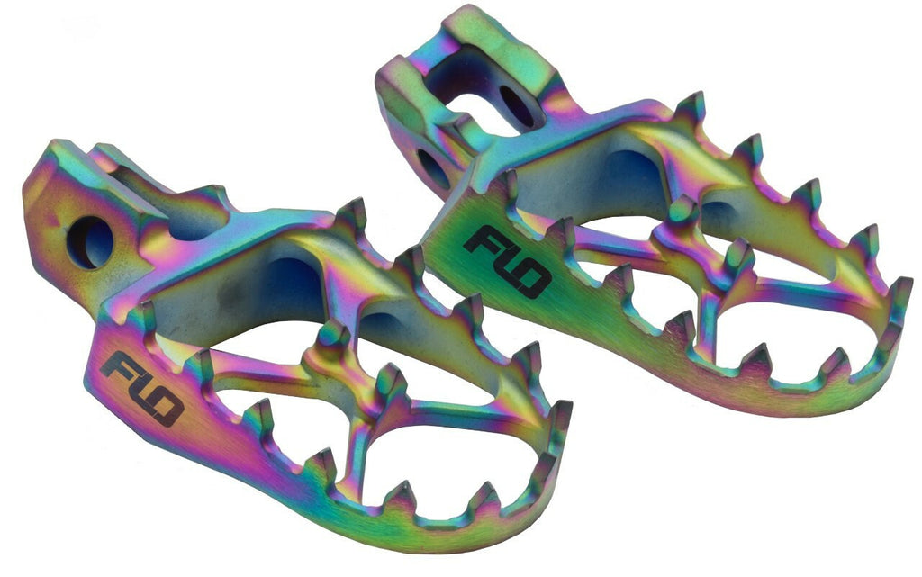 Flo Motorsports Titanium foot pegs for Honda and Kawasaki motorcycles, showcasing durable, lightweight foot controls with textured surface.