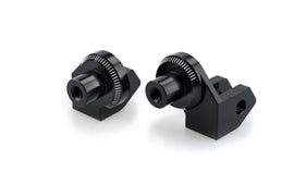 Black PUIG footpeg adapter for Yamaha motorcycle foot controls, showing the sturdy metal mount and textured surface.