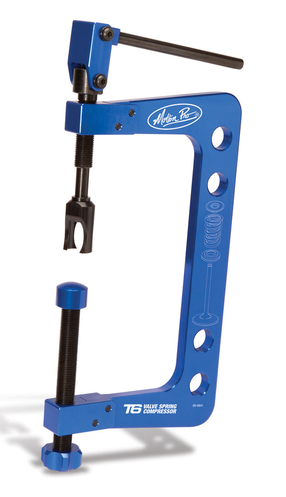 Motion Pro T-6 Valve Spring Compressor tool for motorcycle engine maintenance, showing the compact device in a close-up shot.