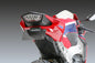 Yoshimura Fender Eliminator V2 Kit for Honda motorcycles, showing sleek black body with mounting hardware and brand logo.