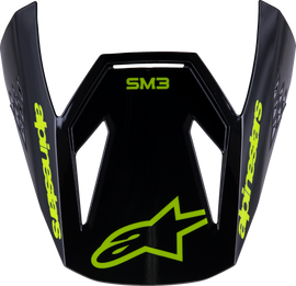Alpine Star Sm3 Youth Radium helmet visor in glossy black and yellow fluo, featuring a clear, reflective shield for motorcycle safety.