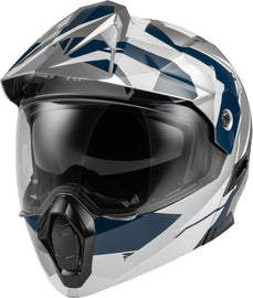 Fly Racing Odyssey Summit helmet in navy, grey, and white, shown from the front with adjustable straps and ventilation features.