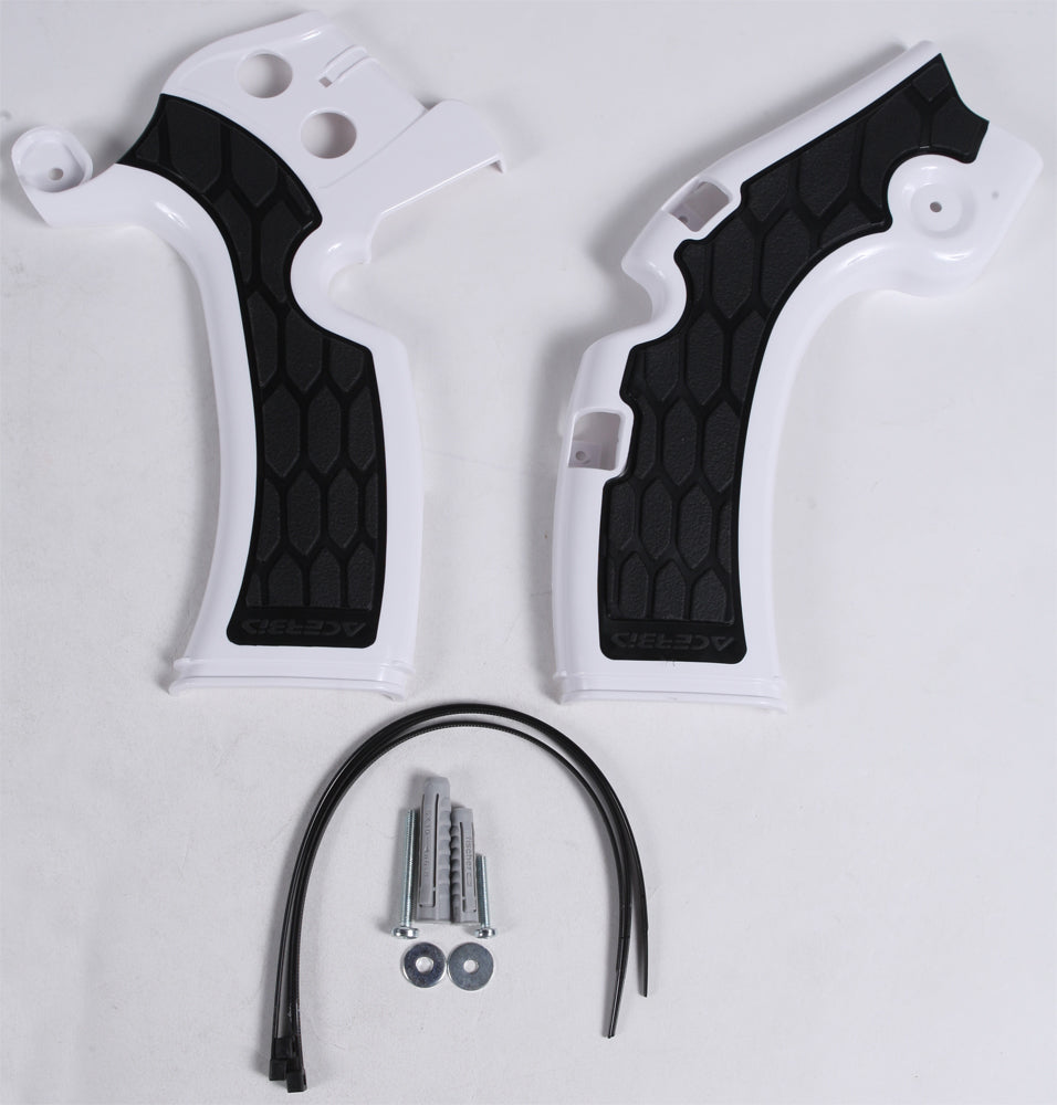 Acerbis X-Grip frame guard for street motorcycles in white and black, mounted on a bike frame showing detailed close-up.