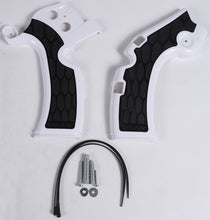 Load image into Gallery viewer, Acerbis X-Grip frame guard for street motorcycles in white and black, mounted on a bike frame showing detailed close-up.