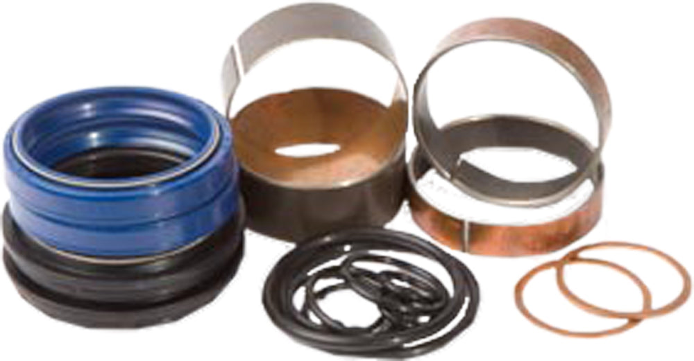 Pivot Works suspension seal and bushing kit for forks, featuring various seals and bushings displayed on a clean background.