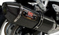 Yoshimura Street R-77 slip-on exhaust with dual stainless steel and carbon fiber components, designed for motorcycle performance.