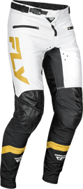Fly Racing Rayce bicycle pants in white, black, and gold, size 28, featuring durable fabric and athletic fit for cycling.