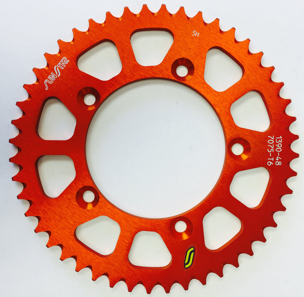 Sunstar aluminum rear sprocket 48-tooth for Husqvarna and KTM motorcycles, 420 chain size, metal finish with branding details.