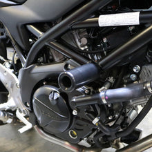 Load image into Gallery viewer, Shogun Industries black Suz 71-14014 frame sliders mounted on a motorcycle body for protection.